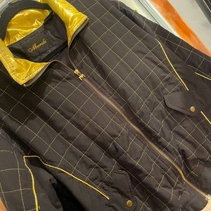 Black and gold windbreaker jacket